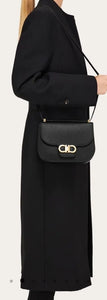 Double Gancini crossbody bag in black
